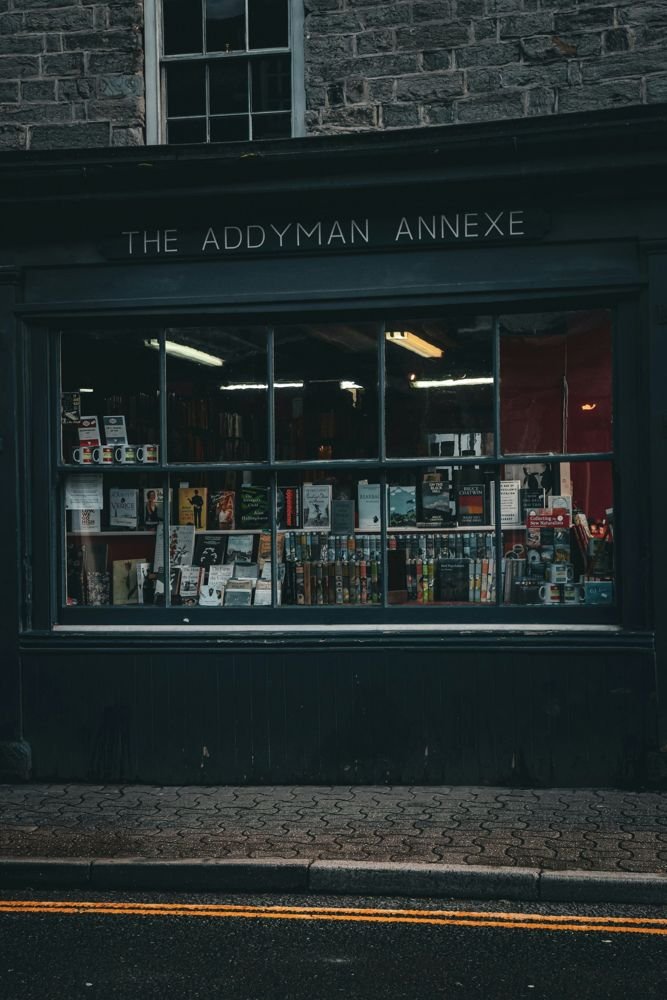 The window of an independent bookshop in Hay-on-Wye, full of books